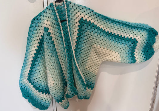 Homemade blue and white crochet cardigan